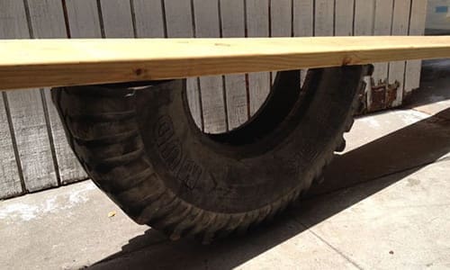 portable seasaw tractor old tire use