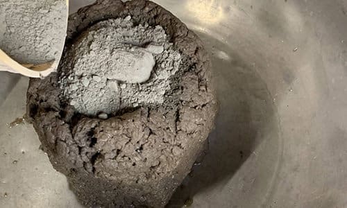 adding cement to papercrate