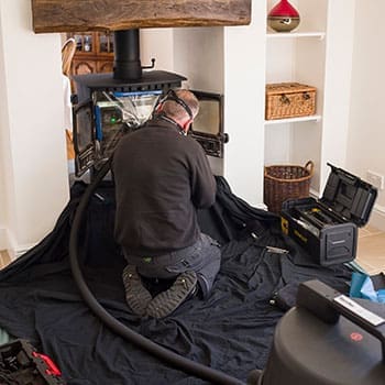 Do This To Your Wood Stove Before Winter