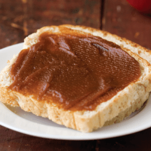 apple butter spread on a slice of bread